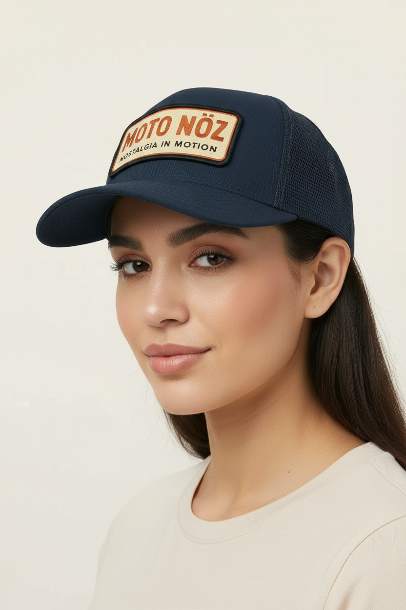 Female Hispanic model wearing MOTO NÖZ Vintage Trucker Cap 3